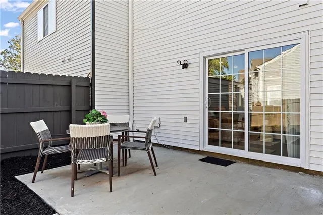 a view of a house with a table and chair