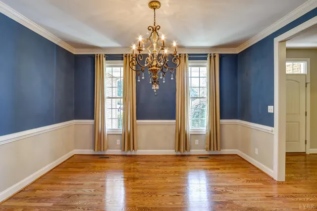 a view of a kitchen and dining room