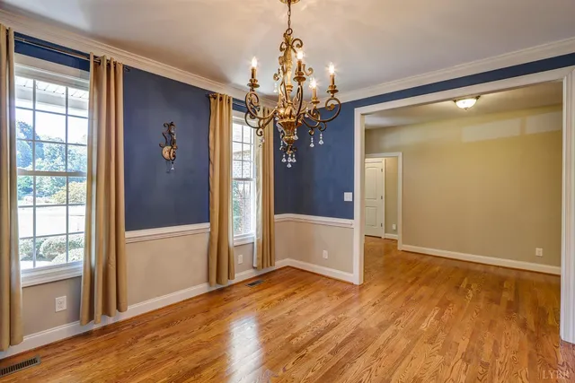 a living room with a fireplace and a window