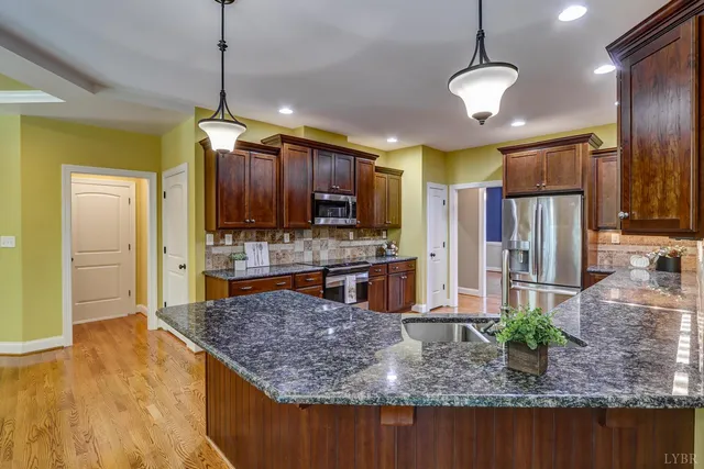 a bath tub sitting in a bathroom next to a window
