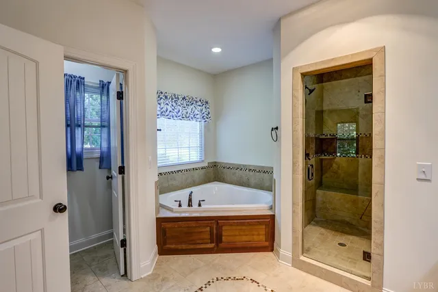 a view of a park with large trees