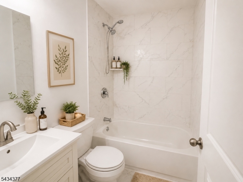207 Old Chimney Ridge Road, Unit B Montague, NJ 07827 - Photo 9 of 10 a bathroom with a sink a toilet and shower