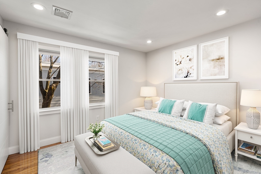 78-80 Rossmore Road, Unit 3 Boston, MA 02130 - Photo 4 of 10 a bedroom with a bed and a window
