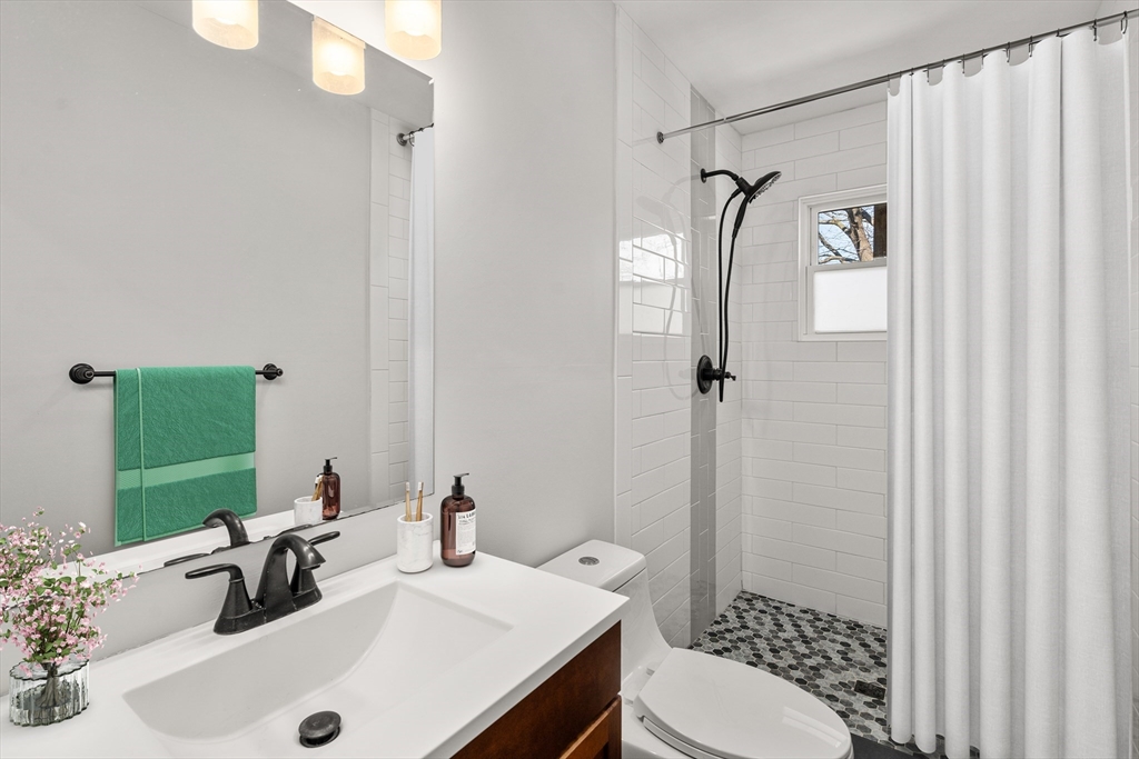 78-80 Rossmore Road, Unit 3 Boston, MA 02130 - Photo 8 of 10 a bathroom with a sink toilet and shower