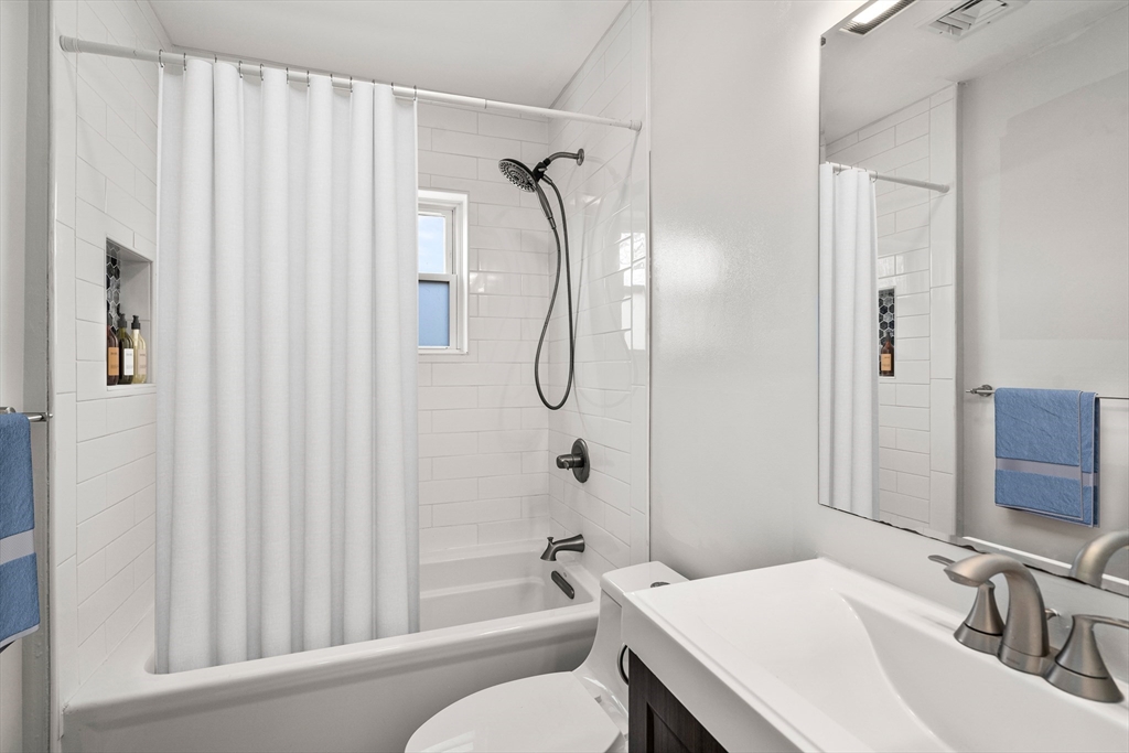 78-80 Rossmore Road, Unit 3 Boston, MA 02130 - Photo 9 of 10 a bathroom with a sink toilet and shower