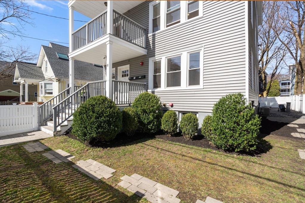 78-80 Rossmore Road, Unit 3 Boston, MA 02130 - Photo 10 of 10 a view of a house with a garden
