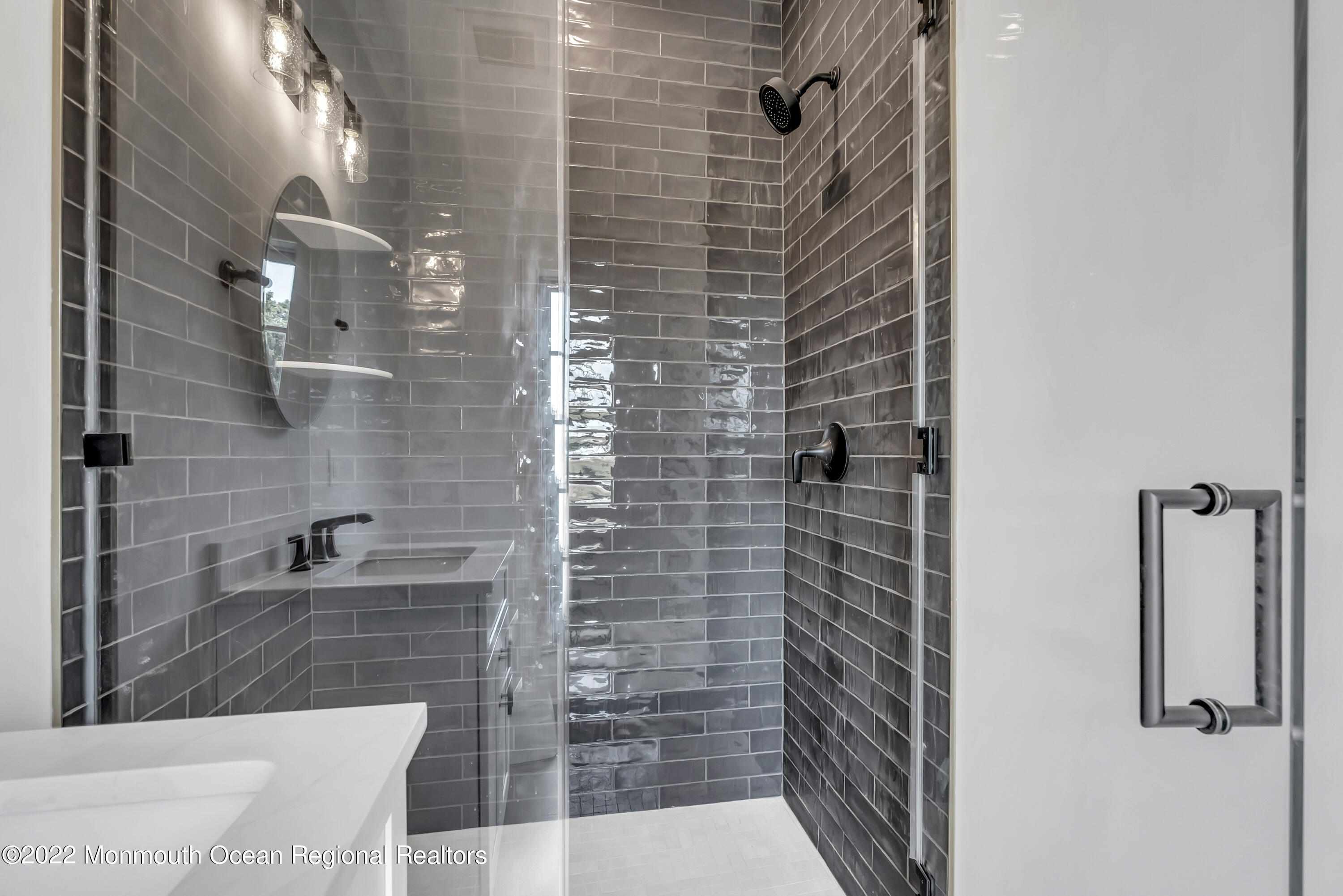 176 Eagle Way Eatontown, NJ 07724 - Photo 28 of 102 a bathroom with a shower and a sink