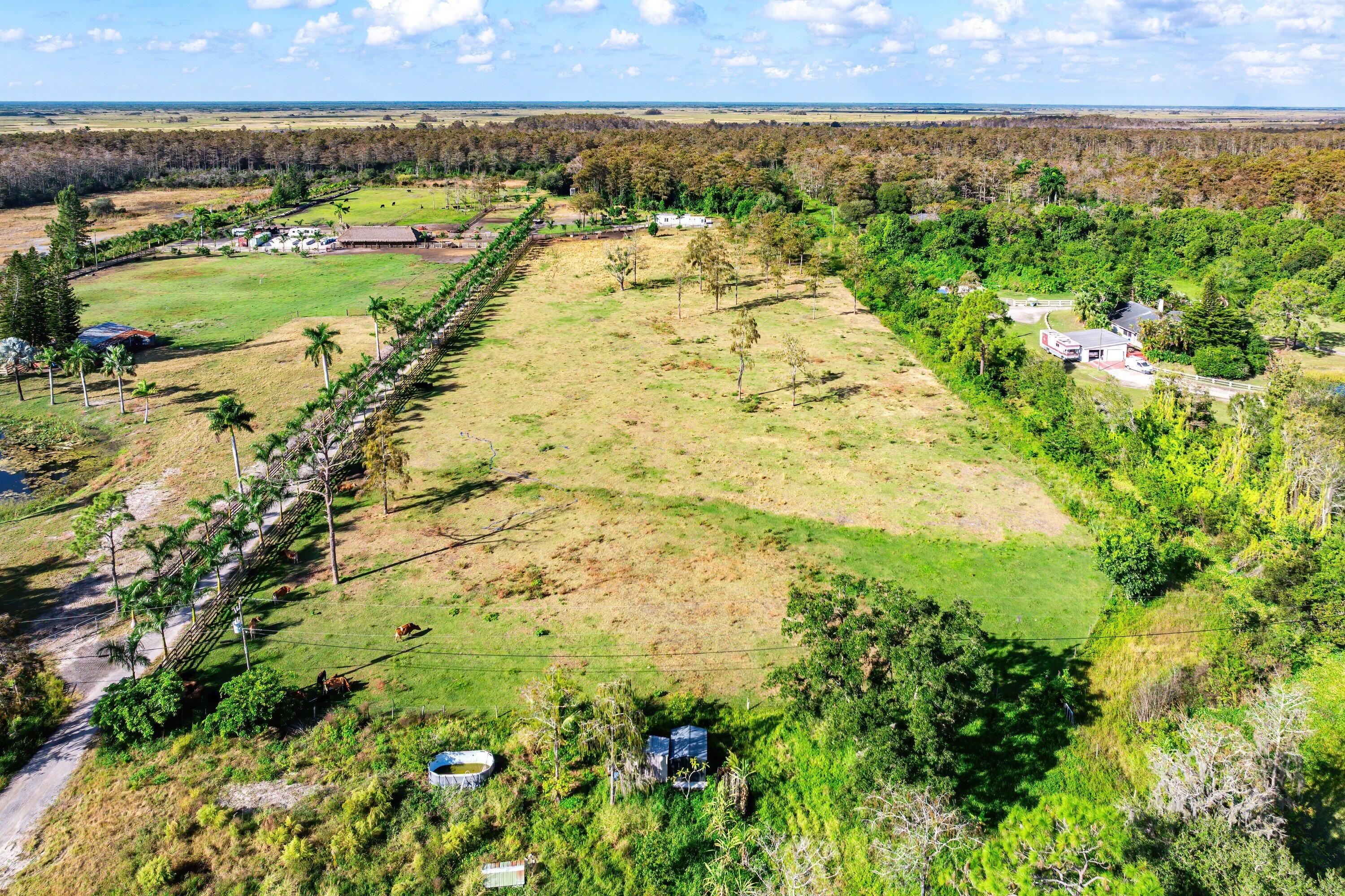 11511 Townsend Lane Boynton Beach, FL 33472 - Photo 14 of 21 a view of a large body of water with a building in the background