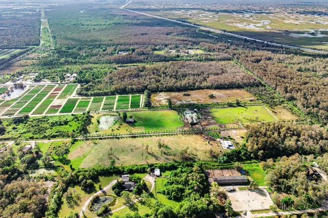 a view of a yard with an ocean