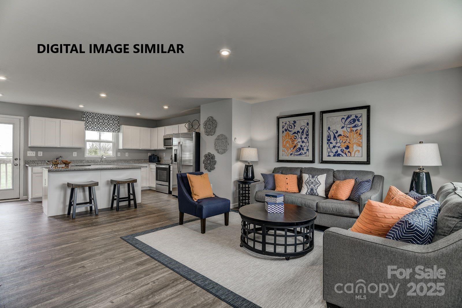 367 Maplestead Street Lancaster, SC 29720 - Photo 2 of 10 a living room with furniture kitchen view and a table