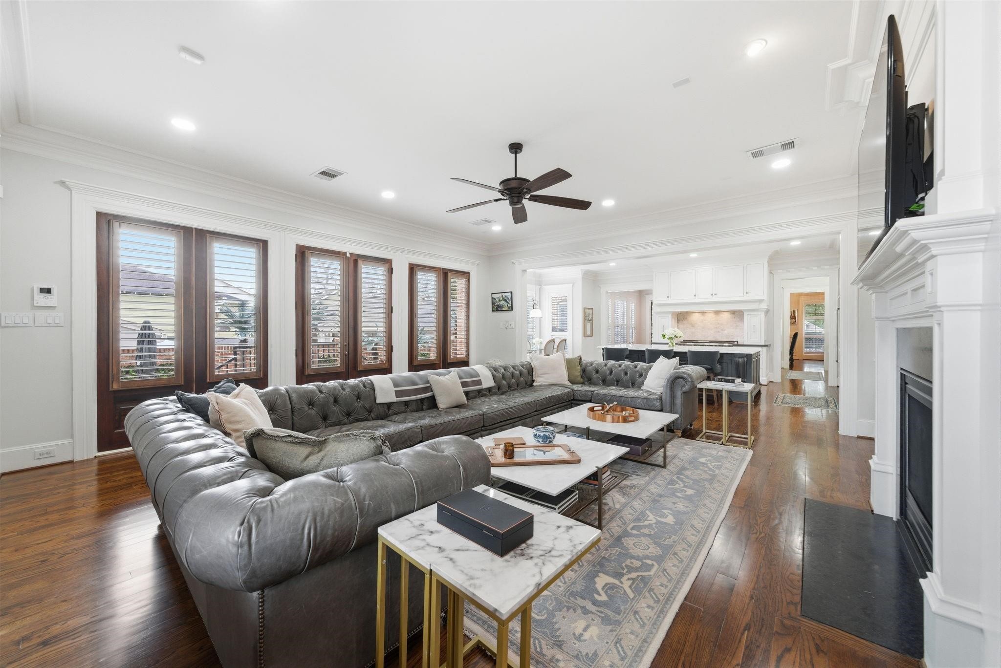 1418 Columbia Street Houston, TX 77008 - Photo 15 of 45 A wall of windows & French doors fill the space with natural light and open directly to the pool, creating an indoor-outdoor connection.