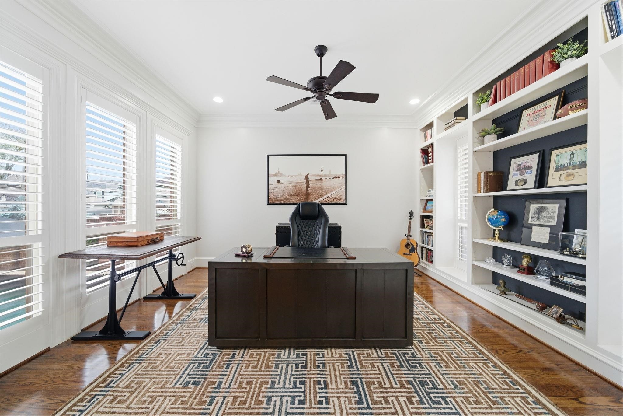 1418 Columbia Street Houston, TX 77008 - Photo 7 of 45 Offering a bright, private work from home setting, the 16’x13’ study features built-in shelving and a wall of windows.