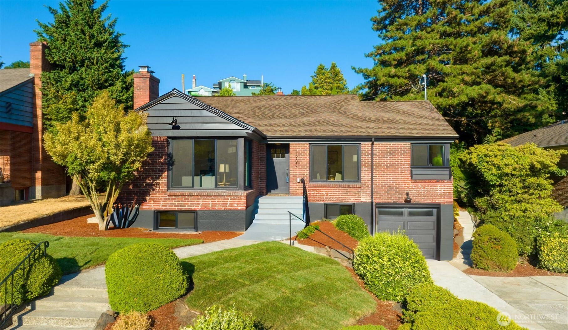 1908 Clise Place West Seattle, WA 98199 - Photo 1 of 1 a front view of a house with garden