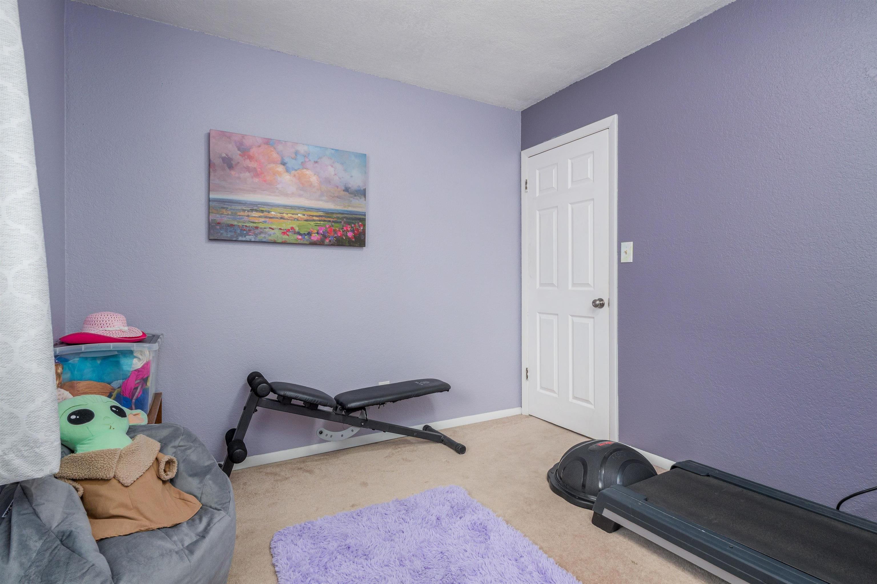 2706 Rincon Drive Grand Junction, CO 81503 - Photo 20 of 42 a room with toys and a wooden floor