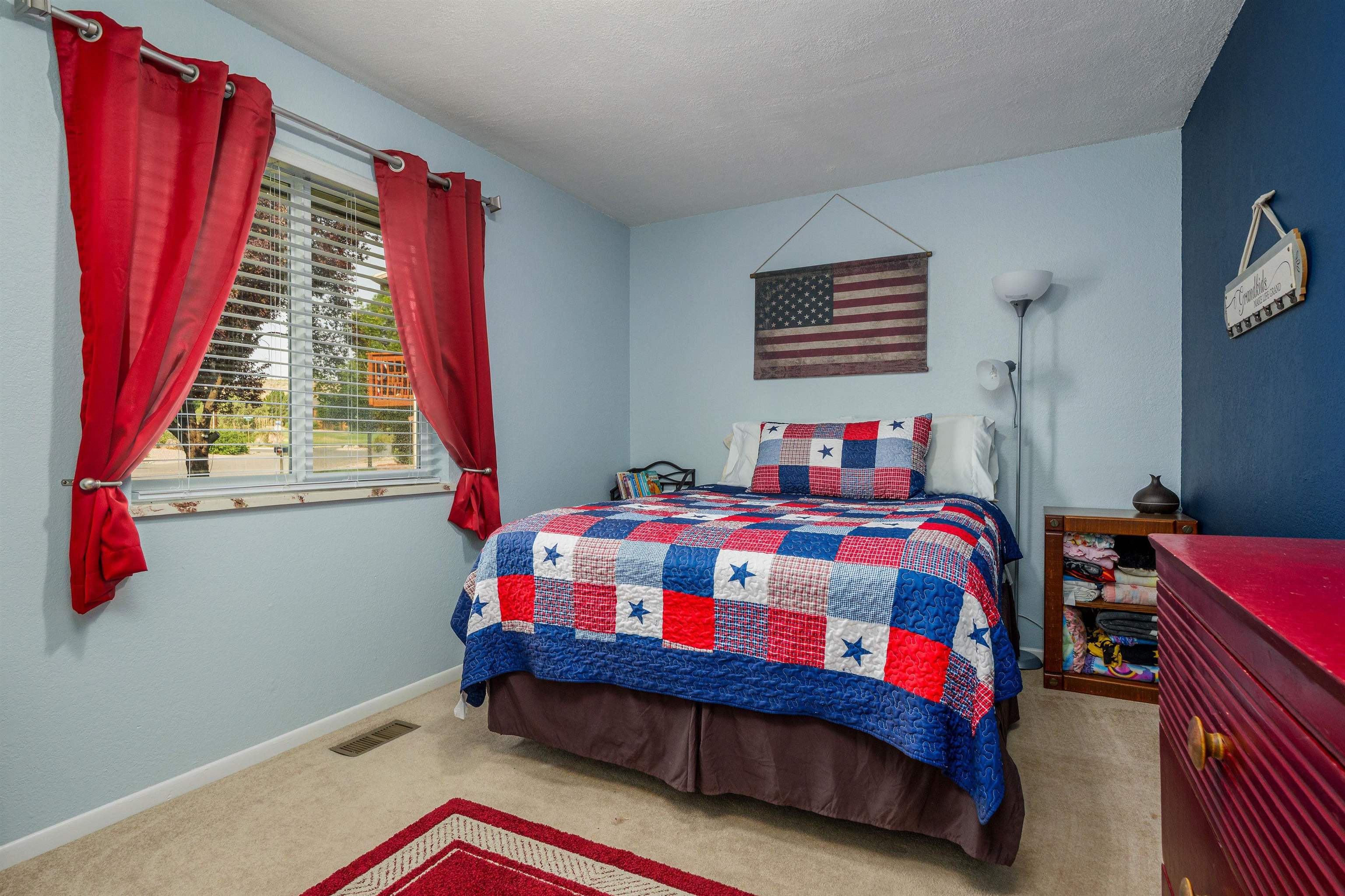 2706 Rincon Drive Grand Junction, CO 81503 - Photo 24 of 42 a bedroom with a bed and a window