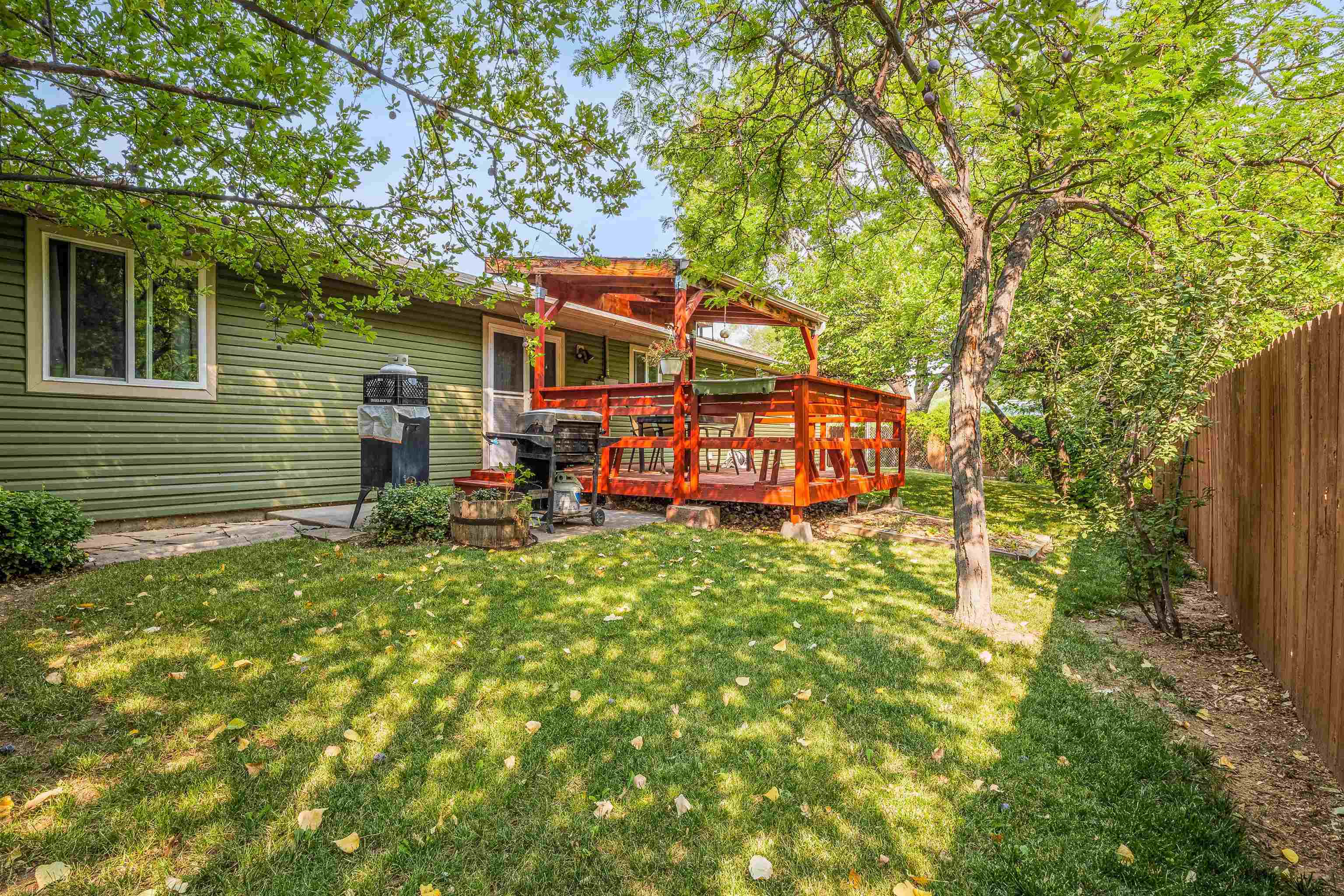 2706 Rincon Drive Grand Junction, CO 81503 - Photo 39 of 42 a backyard of a house with seating space