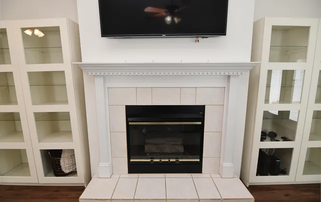 a living room with a fireplace