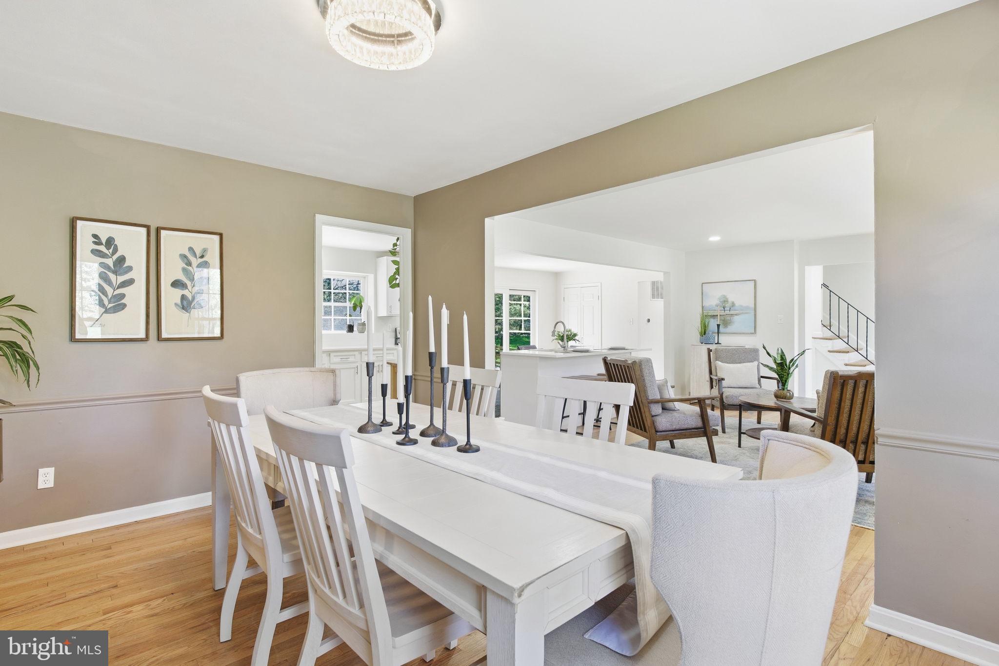 15101 Redgate Drive Silver Spring, MD 20905 - Photo 15 of 39 a view of a dining room with furniture and wooden floor