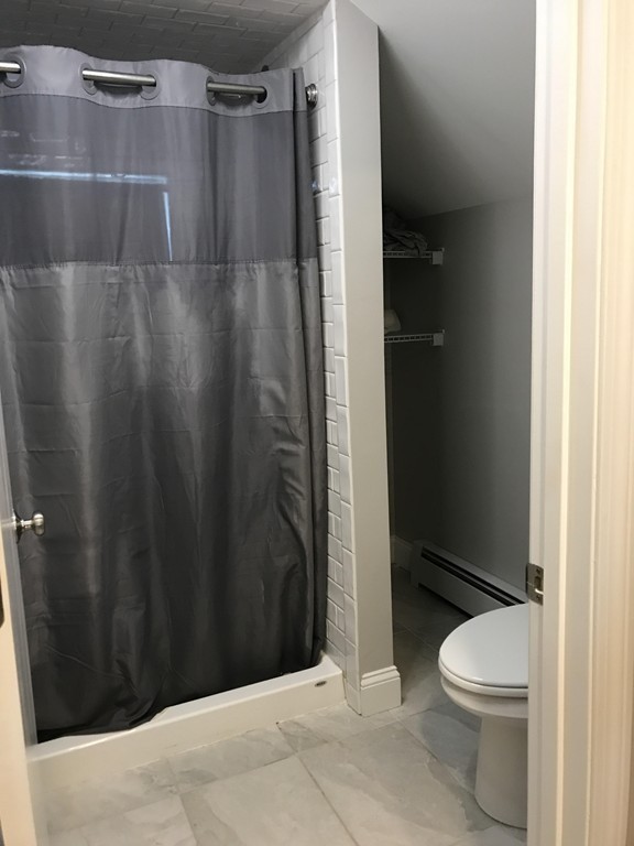 92 Howland Road Fairhaven, MA 02719 - Photo 14 of 27 a bathroom with a shower and a toilet