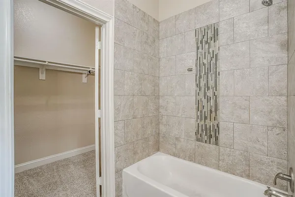 a bathroom with a bathtub