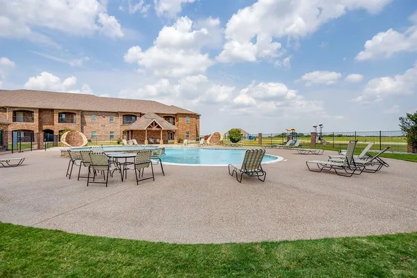 a view of a terrace with chairs