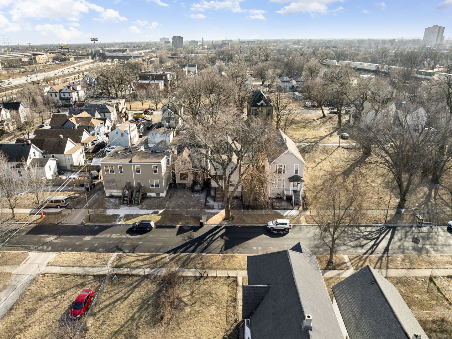 321 West 59th Place Chicago, IL 60621 - Photo 20 of 23 an aerial view of residential houses with outdoor space