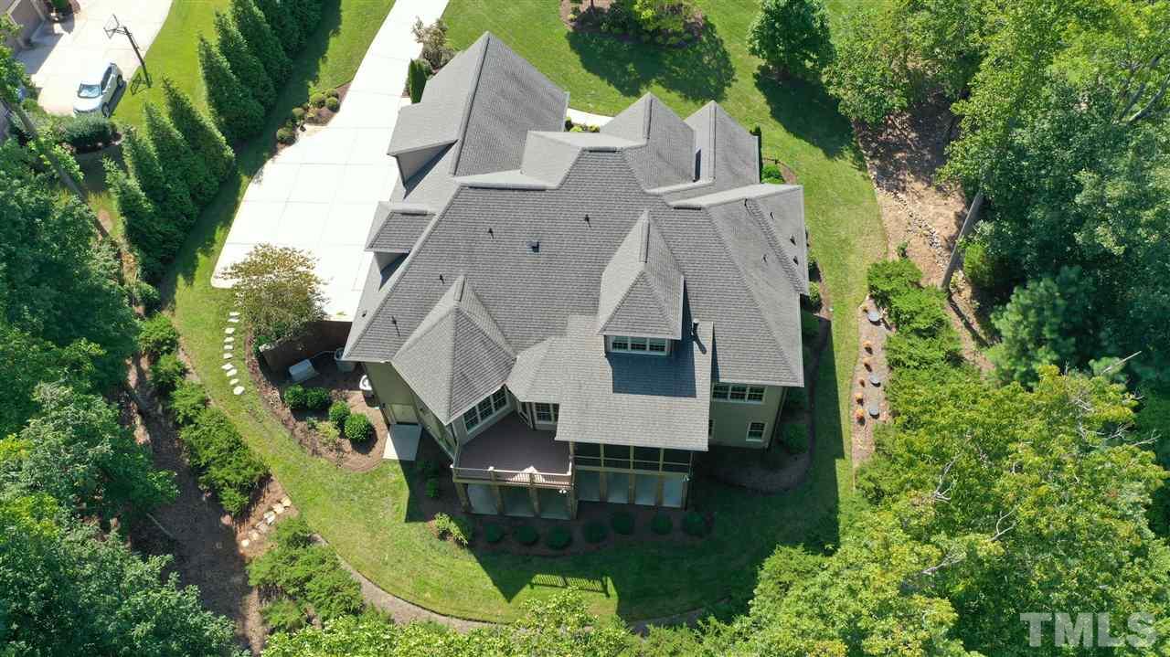 6924 Mactavish Way Raleigh, NC 27613 - Photo 28 of 30 Nature really is your neighbor in this luxury home in excellent condition!