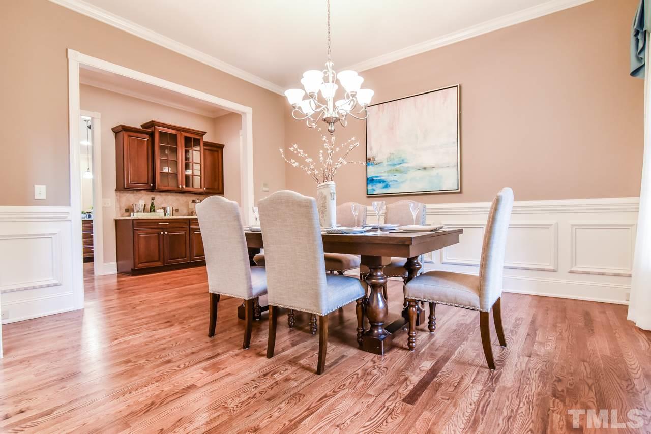6924 Mactavish Way Raleigh, NC 27613 - Photo 6 of 30 Dining room with butler's pantry located conveniently nearby.
