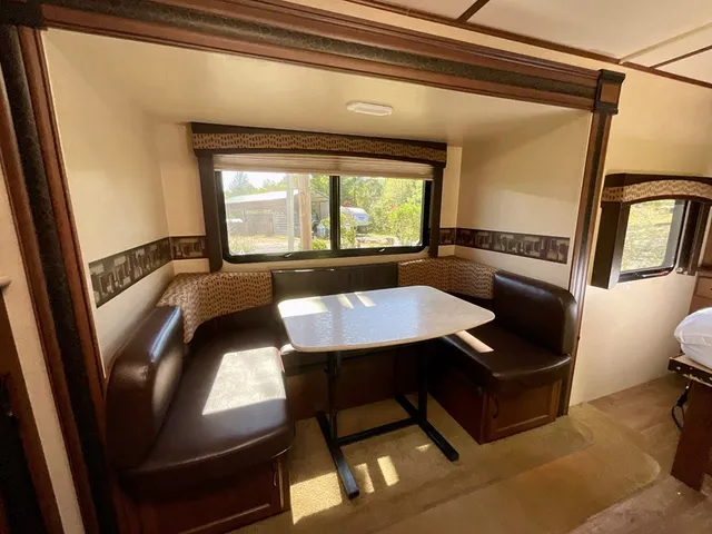 a view of a livingroom with furniture