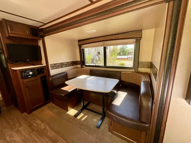 a view of a livingroom with furniture