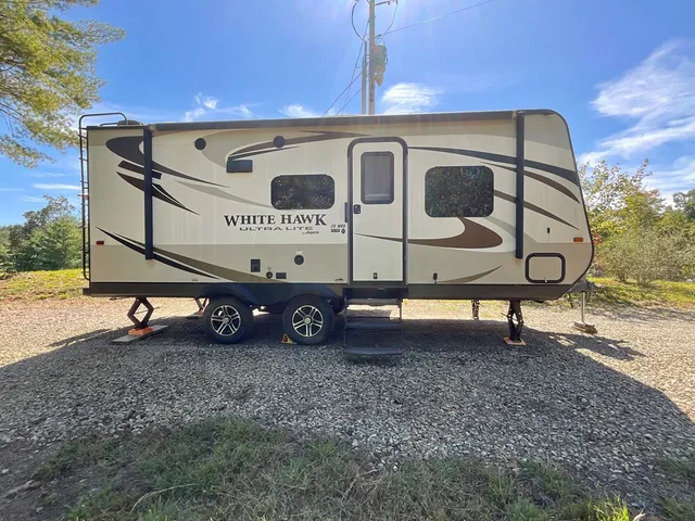 a view of a car park in front of house