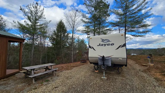 a view of a car in front of a building