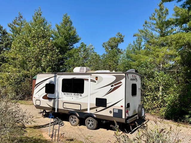 a view of a white house with a outdoor space