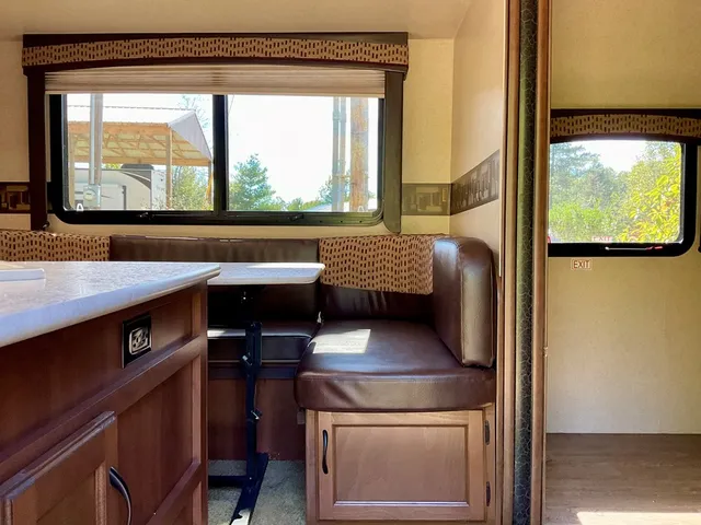 a kitchen view with a stove and a microwave
