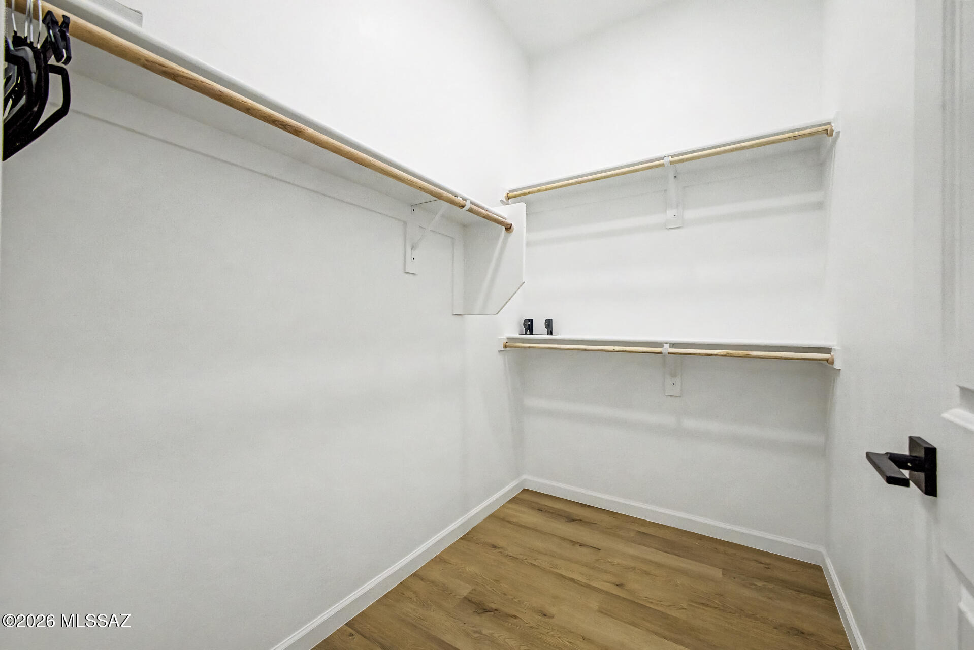 4601 East Magoo Road Tucson, AZ 85739 - Photo 15 of 38 a view of a room with wooden floor