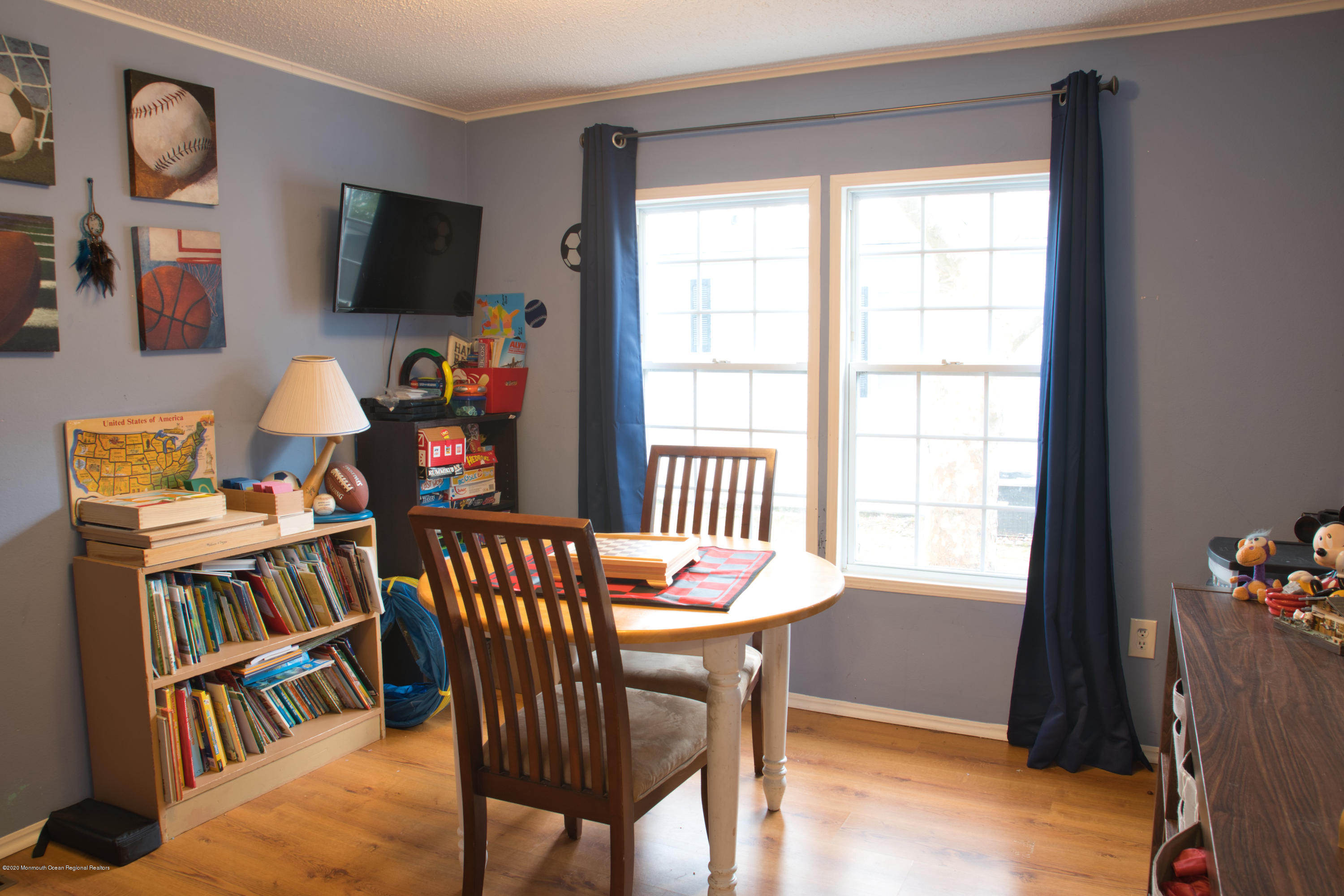 46 Village Road Morganville, NJ 07751 - Photo 9 of 16 a view of a livingroom with furniture and a window