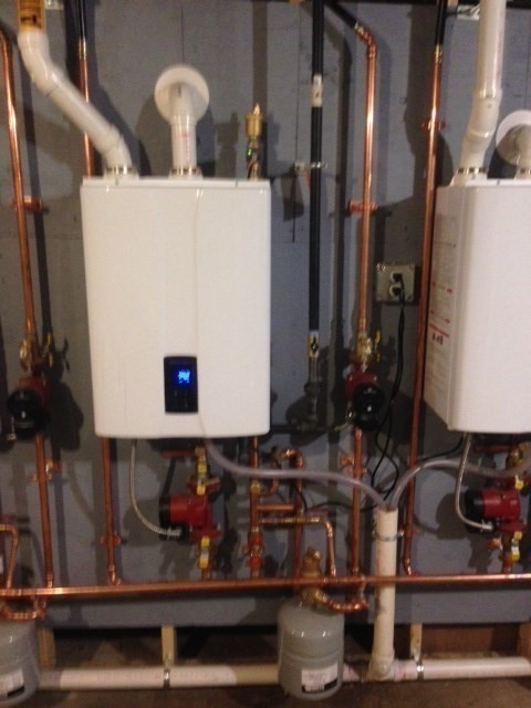 134 Newbury Avenue, Unit 1A Quincy, MA 02171 - Photo 10 of 13 a room with lots of bottles of alcohol