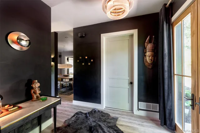a view of livingroom with furniture and window