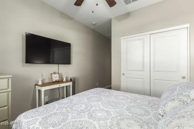 a view of a patio with table and chairs