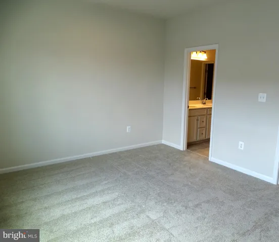 a bathroom with a tub and shower