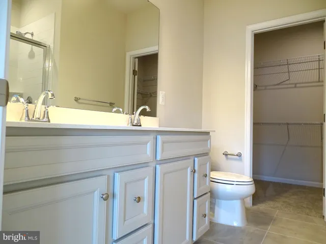 a bathroom with a sink a toilet and a bathtub