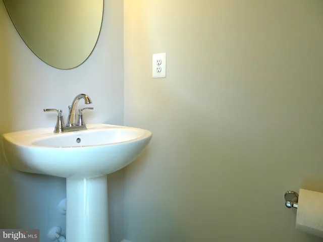 a utility room with washing machine