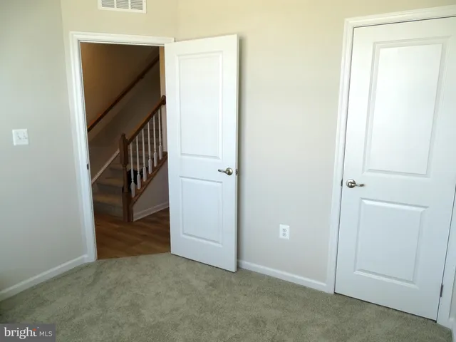 a front view of a house with parking