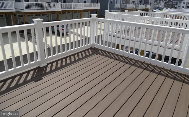 a sign broad in front of flowers