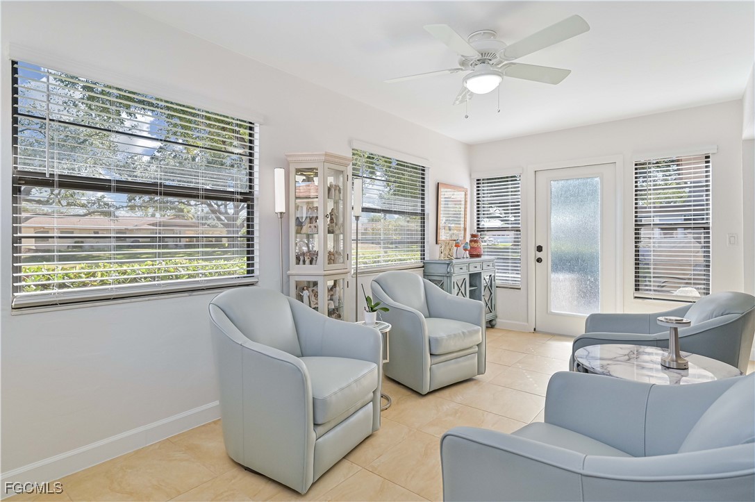 5590 Buring Court Fort Myers, FL 33919 - Photo 14 of 38 a living room with furniture and a large window