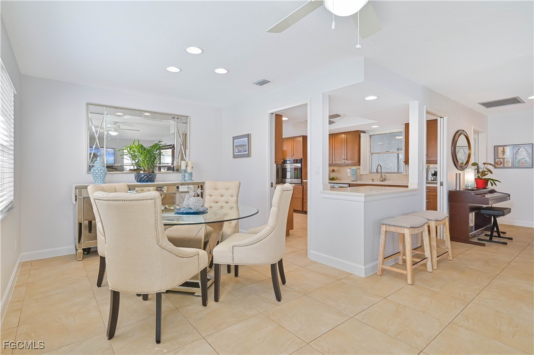5590 Buring Court Fort Myers, FL 33919 - Photo 17 of 38 a view of a dining room with furniture