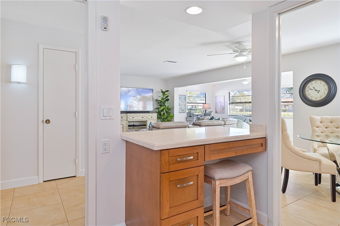 5590 Buring Court Fort Myers, FL 33919 - Photo 22 of 38 a kitchen with a sink cabinets and window