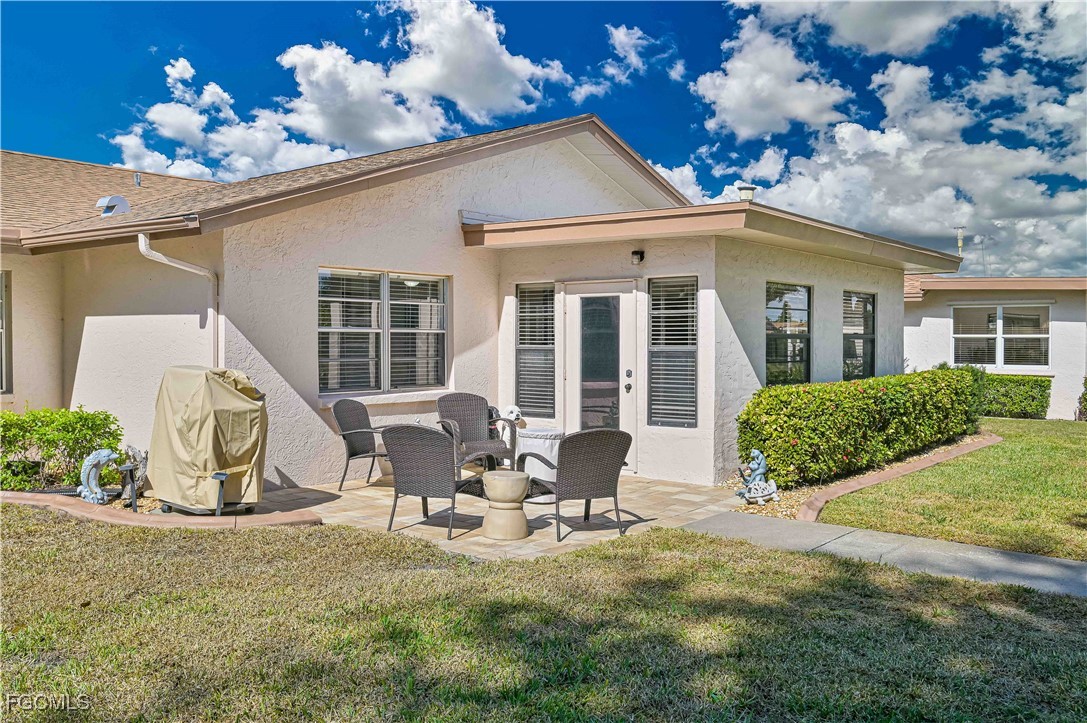 5590 Buring Court Fort Myers, FL 33919 - Photo 3 of 38 a view of a house with backyard and sitting area