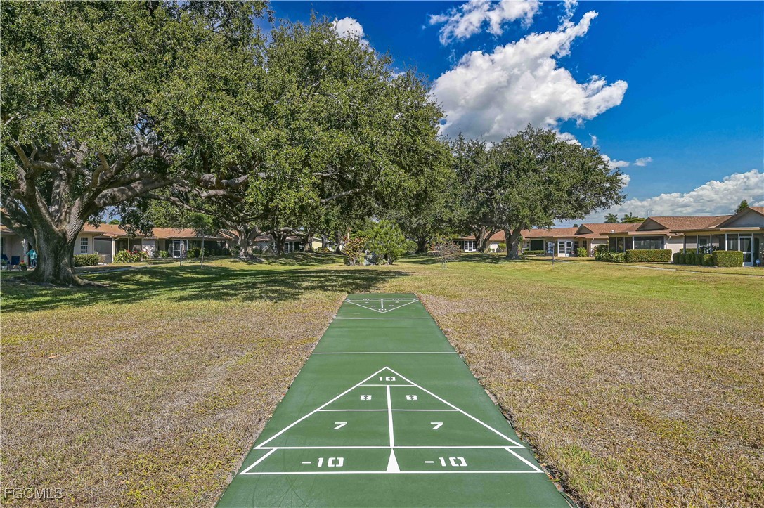 5590 Buring Court Fort Myers, FL 33919 - Photo 37 of 38 a view of a swimming pool with an outdoor space