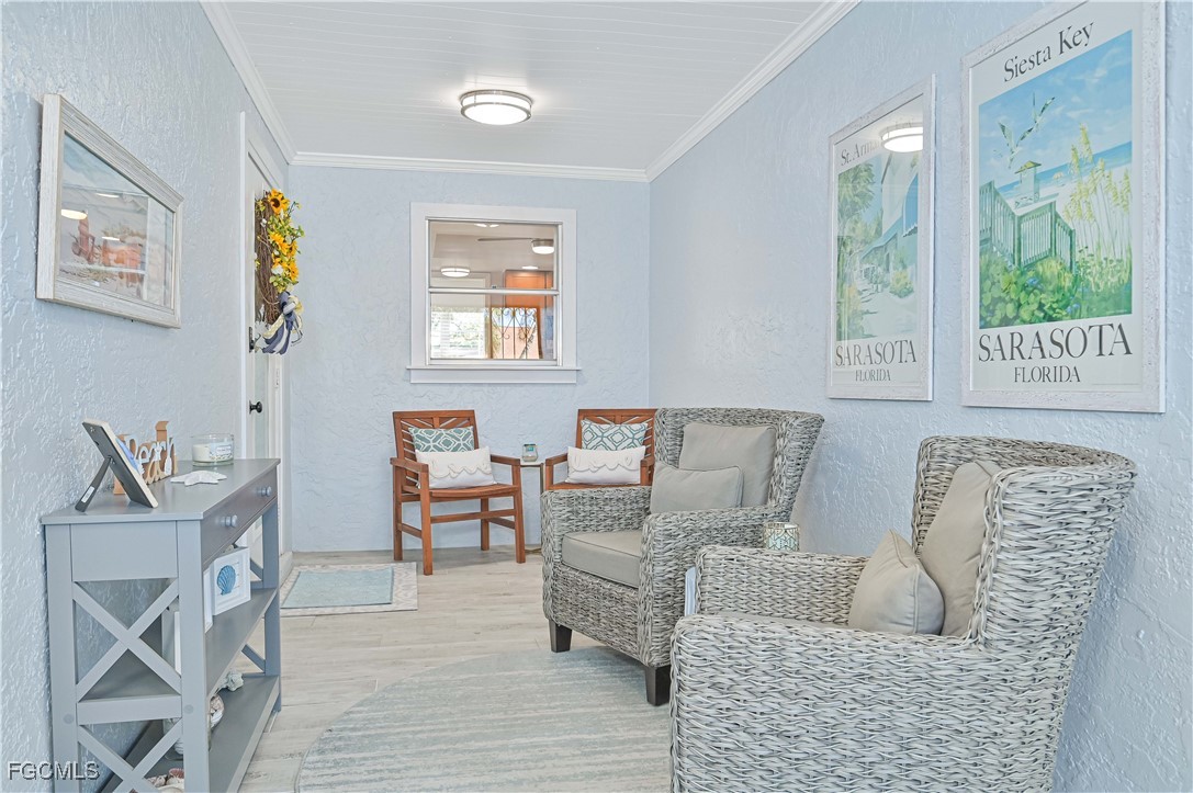 5590 Buring Court Fort Myers, FL 33919 - Photo 7 of 38 a living room with furniture and a window